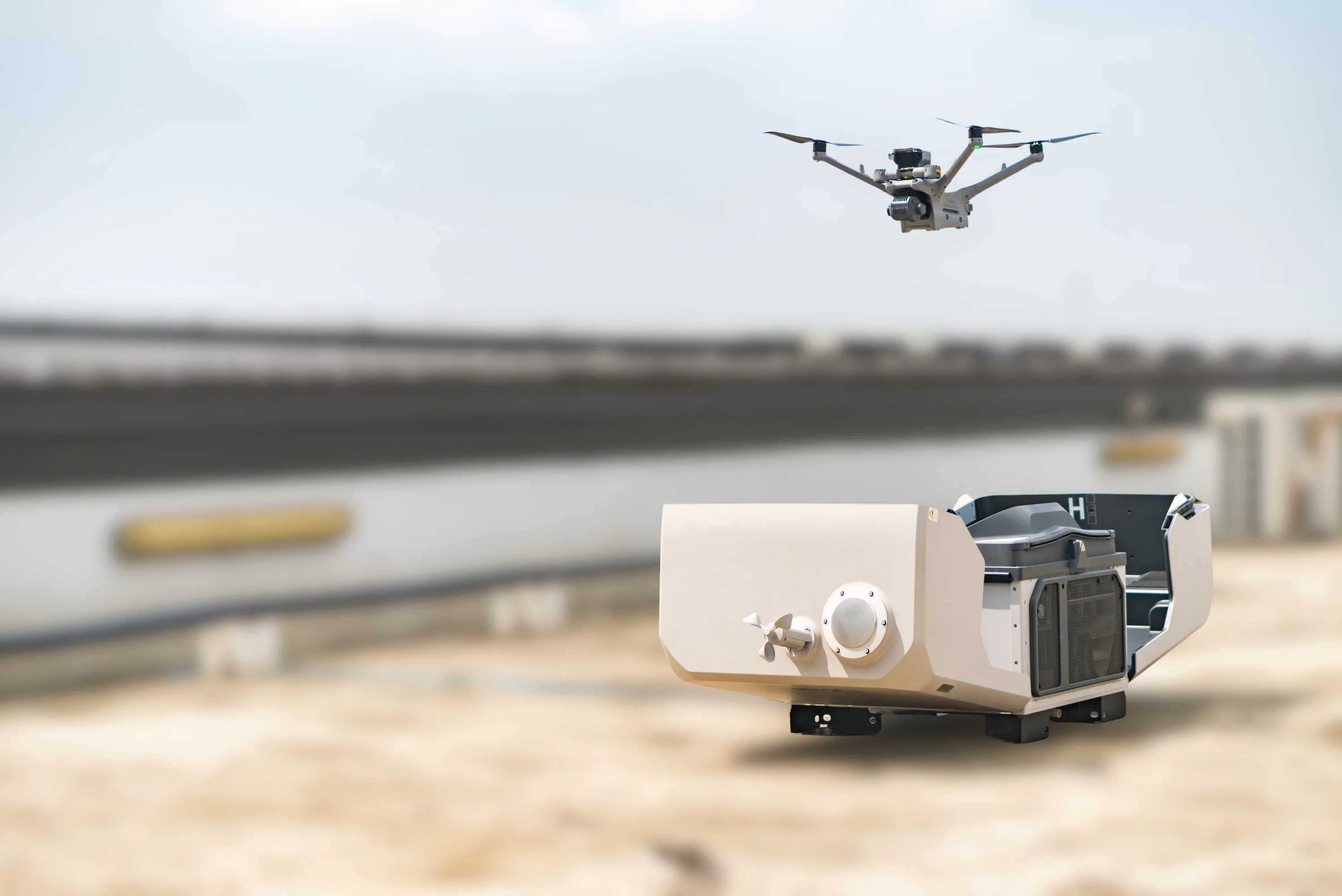 DJI Enterprise dock on site with the aircraft airborne above it