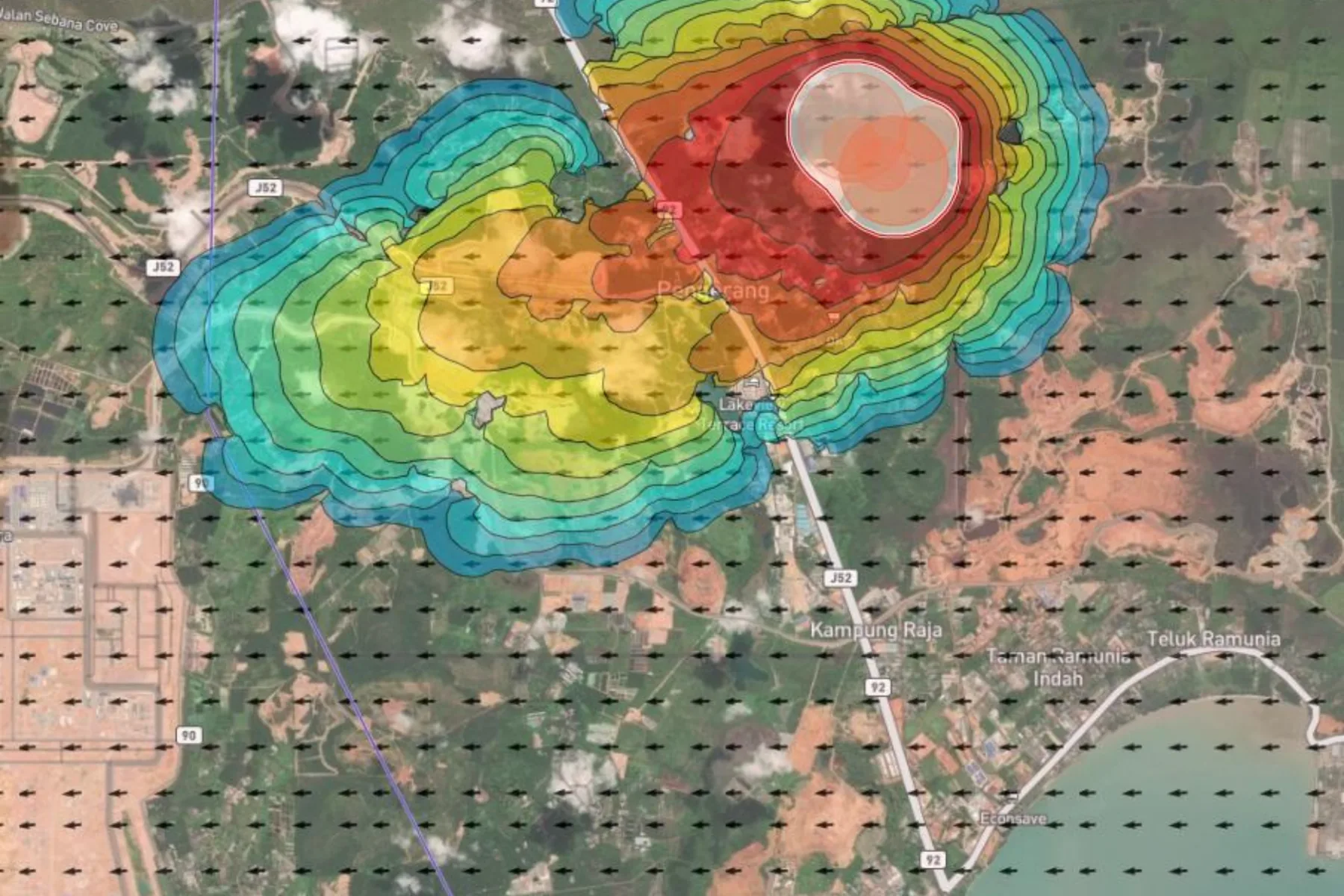 Hazard model over a coastal industrial district in Johor, showing a contoured intensity surface graded from blue through red across the map with a wind field plotted over the surrounding area