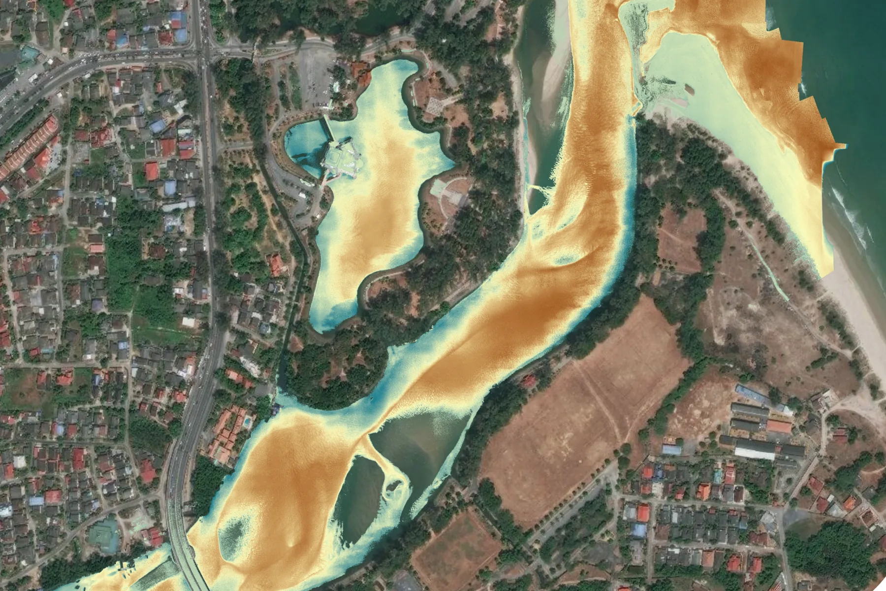 Satellite view of a Malaysian river mouth with a sediment plume classified in orange across the channel and the estuary, beside a village, roads and plantation blocks